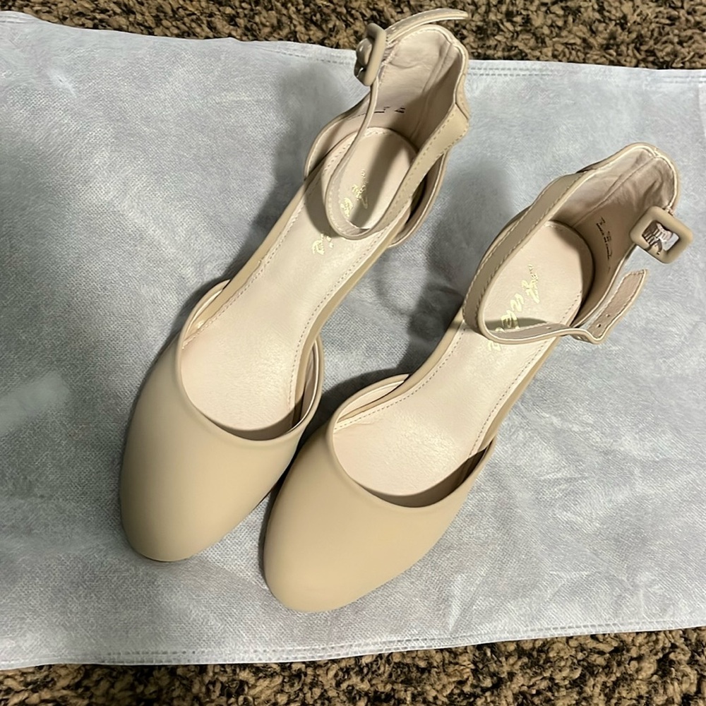 Nude closed-toed heels